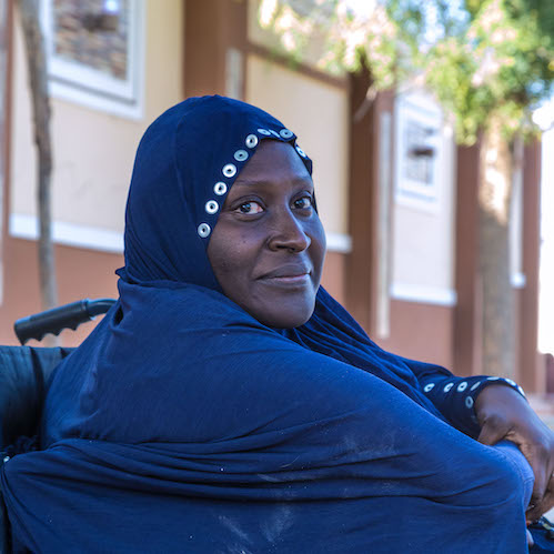 16th Feb. 2020.
Maiduguri, Nigeria.
Adama Balla, 45, is a polio survivor from Borno State. She is a disability rights activist, who holds a masters degree in education from the University of Maiduguri. She became paralysed at 15 months. She is married with two healthy children. Adama is part of what is called the Polio Survivors Group, a group of volunteer polio survivors from the local community. The Polio Survivors Group accompanies vaccination teams during door to door vaccination campaigns to explain to parents who are hesitant to vaccinate their children, the risk that they put their children at if they don’t vaccinate them. “I am very happy that I am part of wild polio eradication,” says Adama. “The next generation will be healthy. No more wheelchairs, no more crutches. It’s about time that people believe that vaccines are safe.”