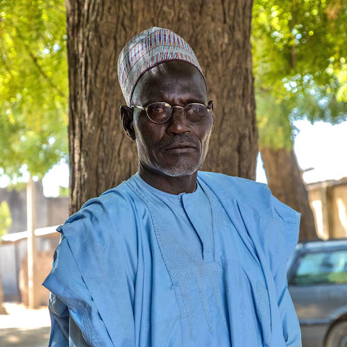 16th Feb. 2020.
Maiduguri, Nigeria.
Adamu Musa, 68, father of Zakaria Musa, a polio community volunteer supporting the polio program immunize children in inaccessible areas. Zakaria, who was in his early 20s, had just finished his school education and was volunteering with the program until he found a stable job. He lost his life only weeks before he got married.“My son Zakaria always wanted to do something meaningful. I am not happy that he died but at least the job he died for is now completed,” Says Musa.