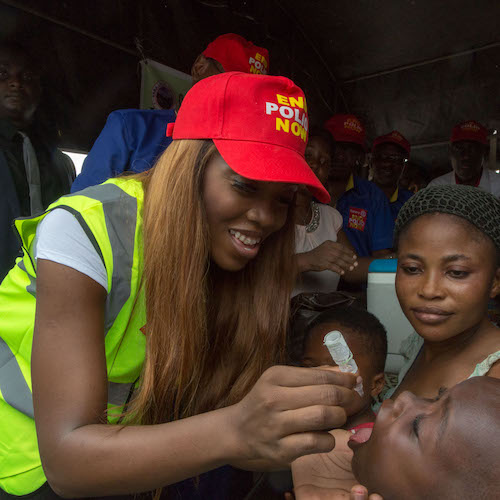 Tiwa Savage administers polio vaccine. Tiwa Savage, Nigerian pop star and mother, joined Dr. Tunji Funsho, Chair of Rotary's National PolioPlus Committee for Nigeria, to participate in a National Immunization Day in Lagos, Nigeria on 22 April 2017. Savage recently joined the End Polio Now campaign as a Polio Ambassador.